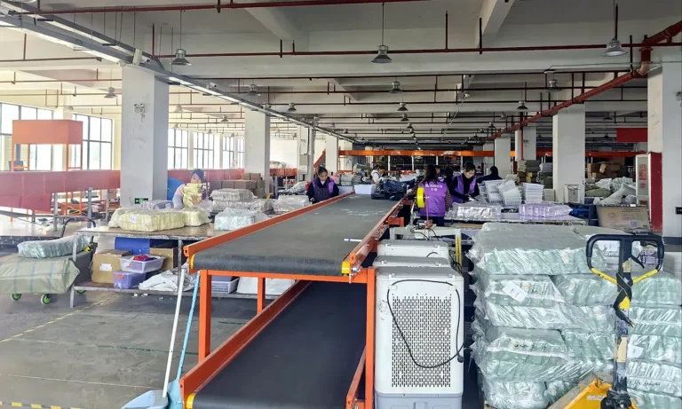 OKISS packing line with workers and conveyor